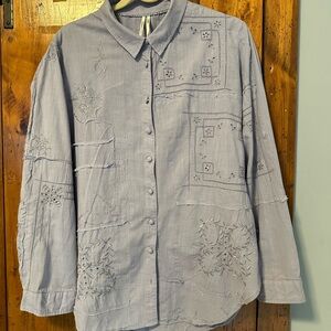 Embroidered button down shirt from Anthropologie.